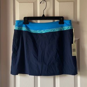 Athletic skirt size L with tags.